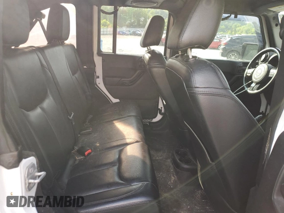 2014 Jeep Wrangler Unlimited Sahara с VIN 1C4BJWEG1EL322781, выставлен на аукционе Copart как лот 64200145 с пробегом 119 500 миль миль и Чистый • Clean title. История ставок и продаж доступна на DreamBid. Изображение 11.