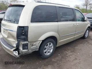 2011 Chrysler Town & Country Touring with VIN 2A4RR5DGXBR666934, listed as a IAAI auction lot 42022807 with 125,920 mi miles and . Bid and sale history available at DreamBid. Image 4.