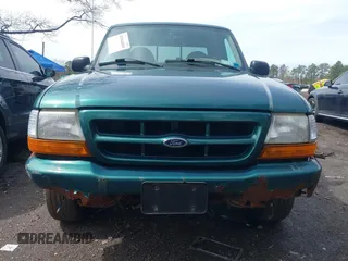 2000 Ford Ranger XL with VIN 1FTYR14V6YTA24267, listed as a IAAI auction lot 41964509 with 140,436 mi miles. Bid and sale history available at carsss.com. Image 6.