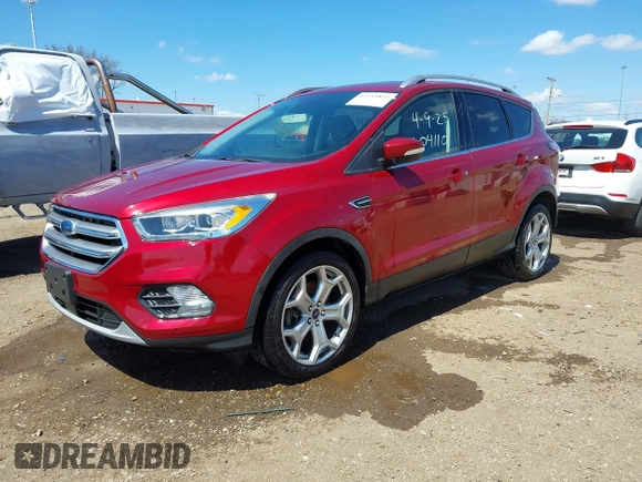 2017 Ford Escape Titanium with VIN 1FMCU9J96HUA68094, listed as a IAAI auction lot 42043893 with 85,893 mi miles. Bid and sale history available at carsss.com. Image 16.