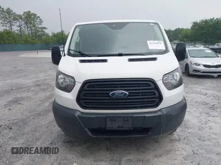 2018 Ford Transit z VIN 1FTYR2YMXJKB11642, wystawiony jako IAAI lot #42235879 z przebiegiem 149 561 mil mil oraz . Historia ofert i sprzedaży dostępna na DreamBid. Obrazek 12.
