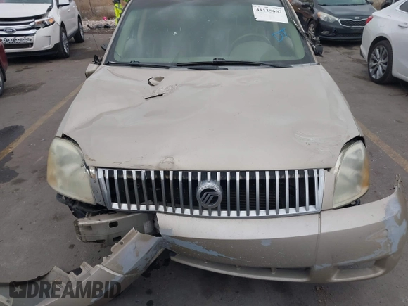 2005 Mercury Montego Luxury z VIN 1MEFM40185G611793, wystawiony jako IAAI lot #41125667 z przebiegiem Nie podano mil oraz . Historia ofert i sprzedaży dostępna na DreamBid. Obrazek 12.