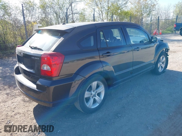 2011 Dodge Caliber Mainstreet z VIN 1B3CB3HAXBD121699, wystawiony jako IAAI lot #42208974 z przebiegiem 120 228 mil mil oraz . Historia ofert i sprzedaży dostępna na DreamBid. Obrazek 4.