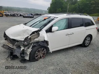 2014 Honda Odyssey EX-L with VIN 5FNRL5H67EB122092, listed as a Copart auction lot 54489725 with 228,025 mi miles and Salvage title. Bid and sale history available at DreamBid. Image 1.