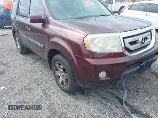 2010 Honda Pilot Touring with VIN 5FNYF4H95AB040721, listed as a IAAI auction lot 41928412 with 213,219 mi miles and . Bid and sale history available at carsss.com. Image 6.