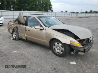 2001 Saturn LS z VIN 1G8JW54R11Y557232, wystawiony jako Copart lot #74638904 z przebiegiem 158 729 mil mil oraz Szkody całkowita. Historia ofert i sprzedaży dostępna na DreamBid. Obrazek 4.