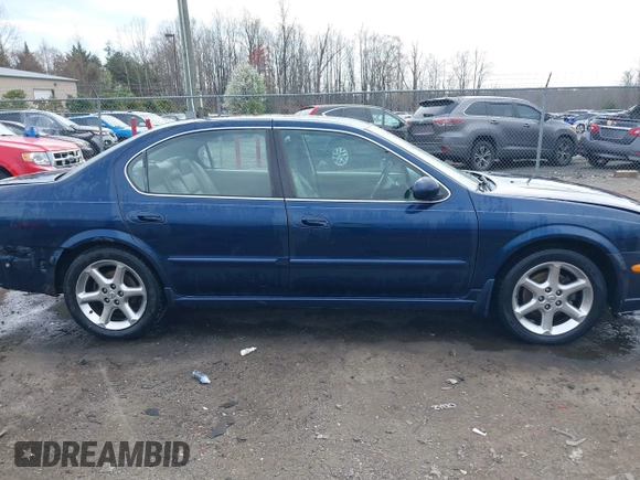 2003 Nissan Maxima GLE z VIN JN1DA31A03T412514, wystawiony jako IAAI lot #41856102 z przebiegiem 156 832 mil mil oraz . Historia ofert i sprzedaży dostępna na DreamBid. Obrazek 14.