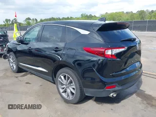 2020 Acura RDX w/Technology Pkg with VIN 5J8TC1H57LL002097, listed as a IAAI auction lot 41957752 with 60,945 mi miles. Bid and sale history available at carsss.com. Image 3.