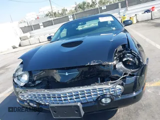 2002 Ford Thunderbird Hardtop Premium with VIN 1FAHP60A52Y109610, listed as a IAAI auction lot 40759746 with 35,975 mi miles and . Bid and sale history available at DreamBid. Image 6.