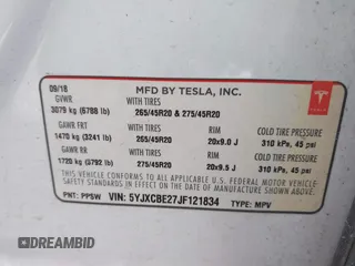 2018 Tesla Model X 75D with VIN 5YJXCBE27JF121834, listed as a IAAI auction lot 41769246 with 90,814 mi miles and . Bid and sale history available at carsss.com. Image 9.