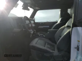 2024 Ford Bronco Big Bend с VIN 1FMDE7AH8RLA93115, выставлен на аукционе Copart как лот 41611185 с пробегом 1 589 миль миль и Списание • Salvage title. История ставок и продаж доступна на DreamBid. Изображение 7.