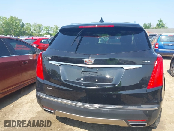 2017 Cadillac XT5 Platinum AWD with VIN 1GYKNFRS6HZ130626, listed as a IAAI auction lot 42470536 with 128,129 mi miles and . Bid and sale history available at DreamBid. Image 16.