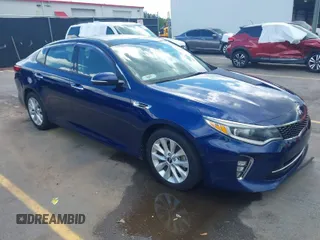 2018 Kia Optima LX with VIN 5XXGT4L32JG189009, listed as a IAAI auction lot 42010285 with 313,004 mi miles. Bid and sale history available at carsss.com. Image 1.