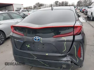 2018 Toyota Prius Plus with VIN JTDKARFPXJ3087064, listed as a IAAI auction lot 41433495 with 118,298 mi miles and . Bid and sale history available at DreamBid. Image 16.