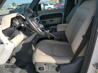 2023 Land Rover Defender S with VIN SALEJ7EXXP2124527, listed as a Copart auction lot 64578725 with 33,816 mi miles and Salvage title. Bid and sale history available at DreamBid. Image 7.