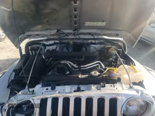 2003 Jeep Wrangler Rubicon z VIN 1J4FA69S53P375189, wystawiony jako Copart lot #54292035 z przebiegiem 55 863 mil mil oraz Szkoda całkowita • Salvage title. Historia ofert i sprzedaży dostępna na DreamBid. Obrazek 11.