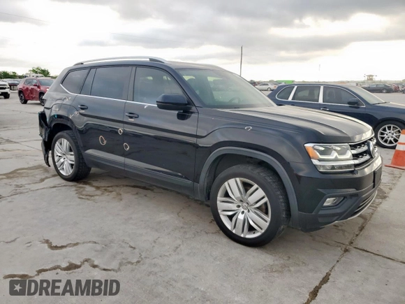 2019 Volkswagen Atlas SE with VIN 1V2UR2CA5KC604781, listed as a Copart auction lot 52719095 with 166,146 mi miles and Salvage title. Bid and sale history available at DreamBid. Image 4.