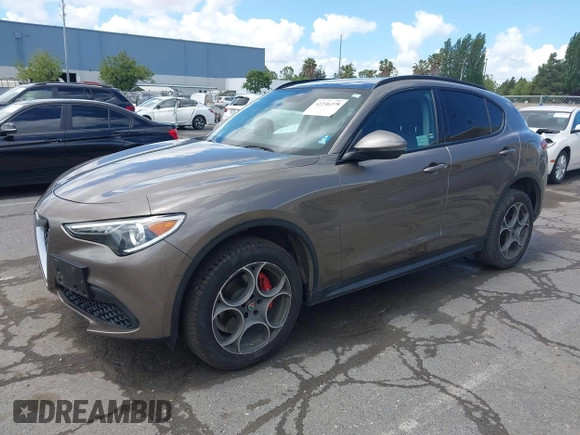 2019 Alfa Romeo Stelvio z VIN ZASPAJAN2K7C48523, wystawiony jako IAAI lot #42246378 z przebiegiem 46 546 mil mil oraz . Historia ofert i sprzedaży dostępna na DreamBid. Obrazek 2.