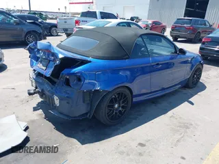 2009 BMW 1 Series 135i with VIN WBAUN93589VK41171, listed as a IAAI auction lot 42397429 with 127,304 mi miles and . Bid and sale history available at DreamBid. Image 4.