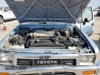 1990 Toyota Pickup DLX z VIN JT4VN13D3L5024456, wystawiony jako Copart lot #75834064 z przebiegiem 200 893 mil mil oraz Szkoda całkowita • Salvage title. Historia ofert i sprzedaży dostępna na DreamBid. Obrazek 11.