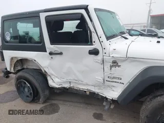 2013 Jeep Wrangler Sport z VIN 1C4AJWAG9DL653348, wystawiony jako IAAI lot #42096860 z przebiegiem 55 575 mil mil oraz . Historia ofert i sprzedaży dostępna na DreamBid. Obrazek 6.