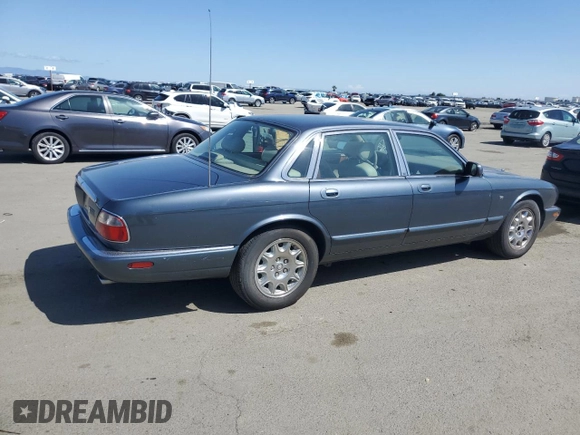 1998 Jaguar XJ with VIN SAJHX1247WC841374, listed as a Copart auction lot 51693595 with 109,509 mi miles and Clean Title. Bid and sale history available at DreamBid. Image 3.