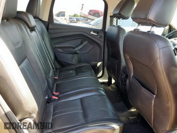 2013 Ford Escape Titanium with VIN 1FMCU0J90DUB95476, listed as a Copart auction lot 58769105 with 96,638 mi miles and Salvage title. Bid and sale history available at DreamBid. Image 11.