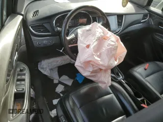 2020 Buick Encore Essence z VIN KL4CJGSB1LB044402, wystawiony jako Copart lot #78628684 z przebiegiem 64 651 mil mil oraz Szkody całkowita. Historia ofert i sprzedaży dostępna na DreamBid. Obrazek 8.