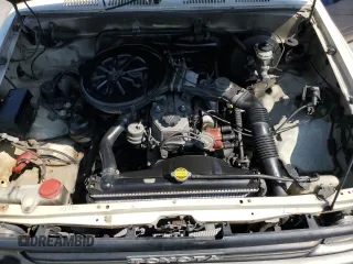 1989 Toyota Pickup z VIN JT4RN81R4K0003524, wystawiony jako Copart lot #56073845 z przebiegiem 153 704 mil mil oraz Tytuł czysty. Historia ofert i sprzedaży dostępna na DreamBid. Obrazek 11.