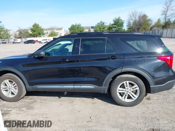 2022 Ford Explorer XLT z VIN 1FMSK8DH6NGB69225, wystawiony jako IAAI lot #41930344 z przebiegiem 24 936 mil mil oraz . Historia ofert i sprzedaży dostępna na DreamBid. Obrazek 14.