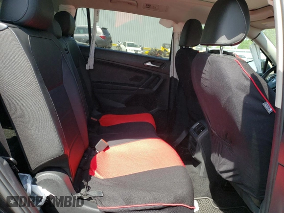 2018 Volkswagen Tiguan SEL z VIN 3VV2B7AX7JM119297, wystawiony jako Copart lot #54416195 z przebiegiem 51 972 mil mil oraz Szkoda całkowita • Salvage title. Historia ofert i sprzedaży dostępna na DreamBid. Obrazek 11.
