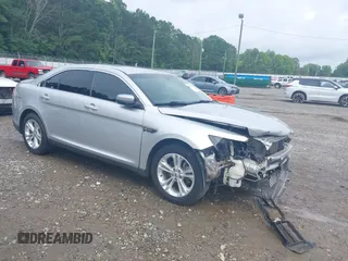2014 Ford Taurus SEL z VIN 1FAHP2E86EG108586, wystawiony jako IAAI lot #42376353 z przebiegiem 153 640 mil mil oraz . Historia ofert i sprzedaży dostępna na DreamBid. Obrazek 1.