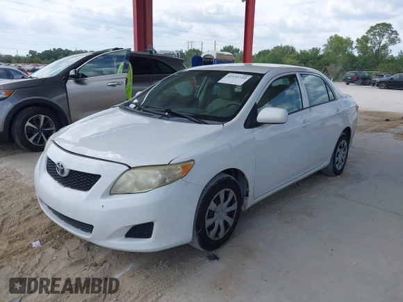 2010 Toyota Corolla with VIN 1NXBU4EE0AZ335239, listed as a IAAI auction lot 42155710 with 215,134 mi miles. Bid and sale history available at carsss.com. Image 2.