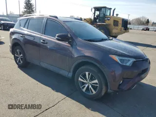 2018 Toyota RAV4 XLE with VIN 2T3WFREVXJW461897, listed as a Copart auction lot 48459355 with 159,479 mi miles and Salvage Title. Bid and sale history available at DreamBid. Image 4.