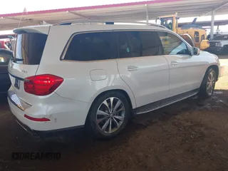 2014 Mercedes-Benz GL 450 with VIN 4JGDF7CE3EA336481, listed as a IAAI auction lot 42025576 with 145,244 mi miles and . Bid and sale history available at DreamBid. Image 4.