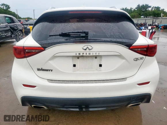 2018 Infiniti QX30 Premium with VIN SJKCH5CP2JA056283, listed as a Copart auction lot 60574585 with 102,573 mi miles and Salvage title. Bid and sale history available at DreamBid. Image 6.