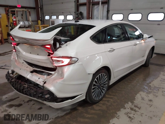 2018 Ford Fusion Titanium with VIN 3FA6P0RU1JR185937, listed as a IAAI auction lot 41863378 with 133,641 mi miles and . Bid and sale history available at DreamBid. Image 4.