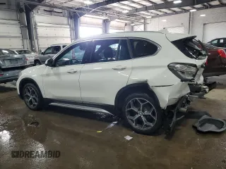 2018 BMW X1 xDrive28i with VIN WBXHT3C30J5L33646, listed as a Copart auction lot 46707525 with 82,656 mi miles and Salvage Title. Bid and sale history available at carsss.com. Image 2.
