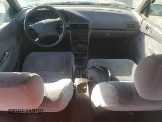 1995 Ford Escort z VIN 1FASP14J9SW304866, wystawiony jako Copart lot #73006174 z przebiegiem 126 068 mil mil oraz Szkoda całkowita • Salvage title. Historia ofert i sprzedaży dostępna na DreamBid. Obrazek 8.
