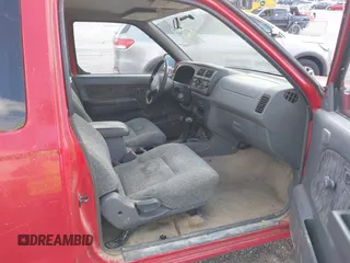 1999 Nissan Frontier XE with VIN 1N6ED26Y4XC338056, listed as a IAAI auction lot 42112483 with 188,950 mi miles and . Bid and sale history available at DreamBid. Image 5.