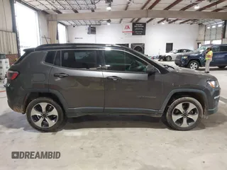 2018 Jeep Compass Latitude with VIN 3C4NJDBB9JT116391, listed as a IAAI auction lot 41953729 with 129,331 mi miles and . Bid and sale history available at DreamBid. Image 13.