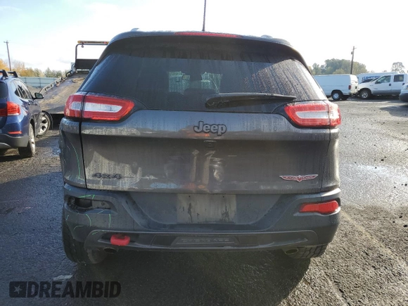 2017 Jeep Cherokee Trailhawk L Plus with VIN 1C4PJMBS1HD237067, listed as a Copart auction lot 77696854 with 102,160 mi miles and Salvage Title. Bid and sale history available at carsss.com. Image 6.