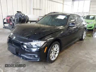 2016 BMW 3 Series 320i with VIN WBA8A9C52GK616953, listed as a IAAI auction lot 41227029 with 73,741 mi miles. Bid and sale history available at carsss.com. Image 2.