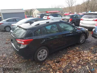 2017 Subaru Impreza Premium with VIN 4S3GTAB69H3704625, listed as a IAAI auction lot 41864611 with 71,352 mi miles. Bid and sale history available at carsss.com. Image 4.