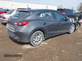 2014 Mazda 3 i Grand Touring with VIN JM1BM1M74E1212699, listed as a IAAI auction lot 41804428 with 195,472 mi miles and . Bid and sale history available at DreamBid. Image 4.