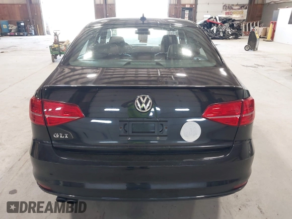 2015 Volkswagen Jetta Sedan 2.0T GLI SE with VIN 3VW5T7AJ0FM275867, listed as a IAAI auction lot 42133491 with 98,718 mi miles. Bid and sale history available at carsss.com. Image 17.
