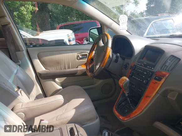 2002 Lexus RX 300 with VIN JTJHF10U720256520, listed as a IAAI auction lot 42074976 with 198,551 mi miles and . Bid and sale history available at DreamBid. Image 5.