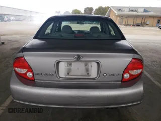 2000 Nissan Maxima GXE z VIN JN1CA31A3YT207949, wystawiony jako Copart lot #54373955 z przebiegiem 350 202 mil mil oraz Szkoda całkowita • Salvage title. Historia ofert i sprzedaży dostępna na DreamBid. Obrazek 6.