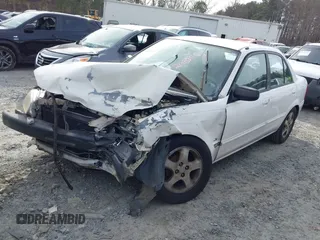 2000 Mazda Protege DX with VIN JM1BJ2221Y0208156, listed as a IAAI auction lot 41609657 with 435,304 mi miles and . Bid and sale history available at DreamBid. Image 16.