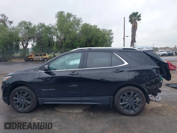 2020 Chevrolet Equinox LT with VIN 2GNAXLEX0L6174015, listed as a IAAI auction lot 41900966 with 144,116 mi miles. Bid and sale history available at carsss.com. Image 15.